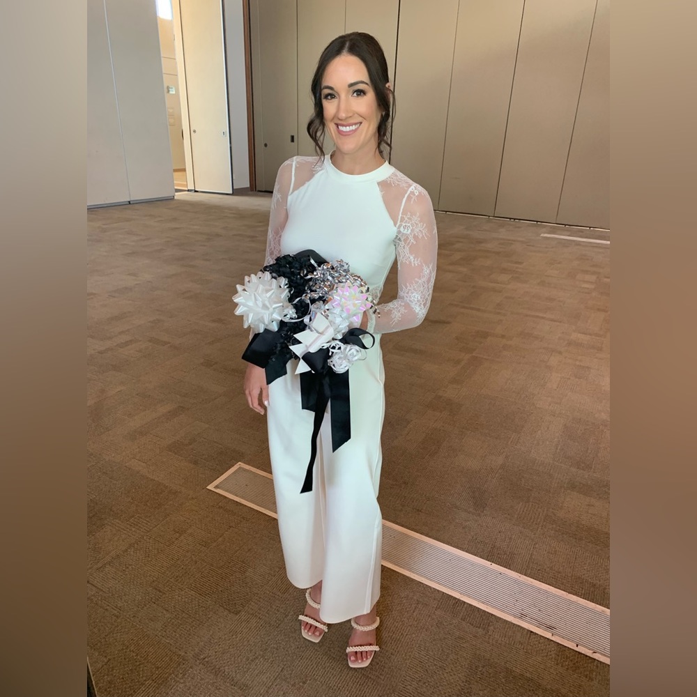 Ivory jumpsuit with lace sleeves